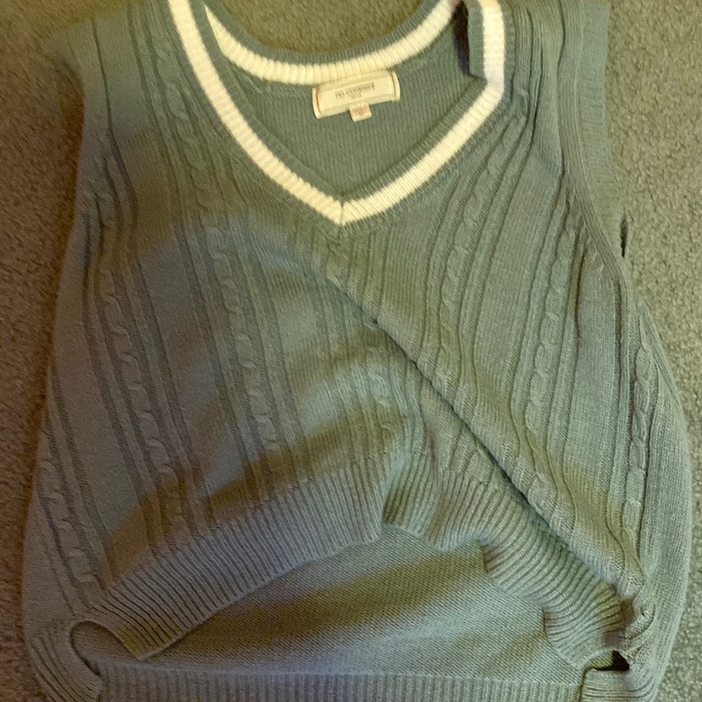 This is a green tank top that is knitted!!